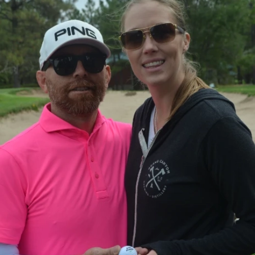 flores couple at golf tournament