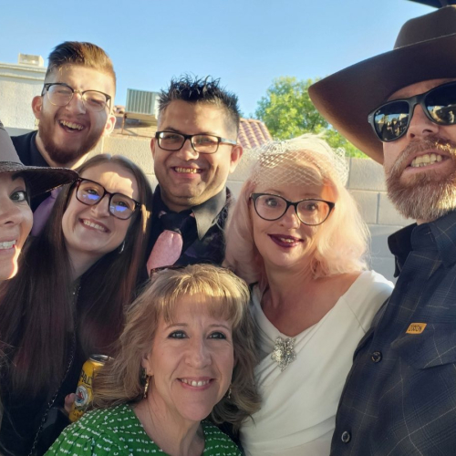 flores family all together taking a family selfie
