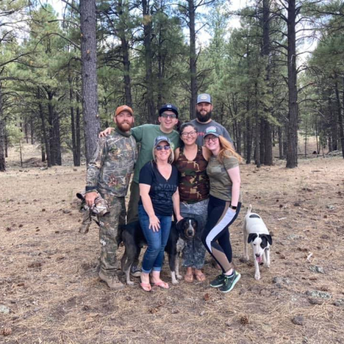 flores family out hunting and camping with their dogs